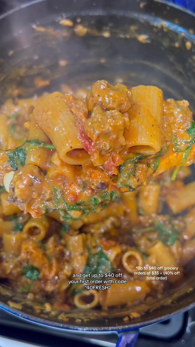 #ad #DoorDash_Partner Creamy One-Pan Tuscan Pasta with Hot Italian Sausage, Sun-Dried Tomatoes, and Spinach ❤️‍🔥 This is hands down one of my favorite pasta dishes I’ve ever made. Creamy, spicy, and super flavorful with the toasted spices and sun-dried tomato oil. It’s INCREDIBLE. I ordered all my groceries through DoorDash–YOU should do the same and get up to $40 off your first grocery order with code “40FRESH” (*up to $40 off grocery orders of $35 + 40% off total order)! Here’s how to make it: 1 lb hot italian sausage, casings removed (can sub mild) ½ - 1 tbsp sun-dried tomato oil 1 cup yellow onion, diced 1 tsp red pepper flakes, to taste 1 tsp Italian seasoning 6-8 cloves garlic, minced, to taste Salt and pepper, to taste 3 tbsp tomato paste 1/2 cup dry white wine (sav blanc or pinot grigio) 3 - 3.5 cups beef broth (use the full 3.5 for extra sauciness) 1 cup cream ½ cup sun-dried tomatoes, to taste 1 lb rigatoni pasta 2 handfuls spinach (about 2 cups) 1 cup freshly grated parmesan cheese, to taste (plus more for garnish) 1 tbsp butter, optional 1. Break apart your sausage links into small pieces. 2 Heat a dutch oven, or large pot, over medium heat. Add in your sausage in one layer and let sit, undisturbed for a few minutes (this will help get a nice brown crust). Once you feel the pieces easily lifting from the pan, give it a stir and continue cooking until browned and cooked through. Remove from the pan and set aside. 3. Reduce heat to medium/low. Add in your sun-dried tomato oil followed by your onion, a pinch of salt, red pepper, and italian seasonings. Stir and saute for a few minutes. 4. Add in your garlic and stir. Let cook for another 30 seconds. 5. Clear a center in your pot and add in your tomato paste. Let the paste cook off in the pot for about 2 minutes before incorporating with the rest. 6. Stir your tomato paste in with your onion and garlic. Let that cook for another minute or two. 7. Pour in your white wine, stir, and let that simmer until reduced by half (3 minutes or so). 8. Pour in your beef broth, cream, and sun-dried tomatoes. Season with salt and pepper. 9. Pour in your uncooked pasta and stir. Cover and simmer on low for 20 minutes, or until al dente. Stirring somewhat frequently, you don’t want your pasta to stick to the bottom. 10. Once your pasta is done cooking, add your cooked italian sausage back to the pot followed by your spinach, parmesan cheese, and butter. Stir, taste for seasonings, and serve with extra parmesan cheese. Enjoy! Serves: 4-6 #onepan #onepanmeal #onepanrecipe #onepandinner #onepot #onepotpasta #onepotmeals #onepotrecipe #easydinner #dinnerideas #weeknightdinner #easyrecipe #easyrecipes #foodtok #cooking #pasta #pastatok #pastarecipe #easypasta #tuscanpasta #creamypasta 