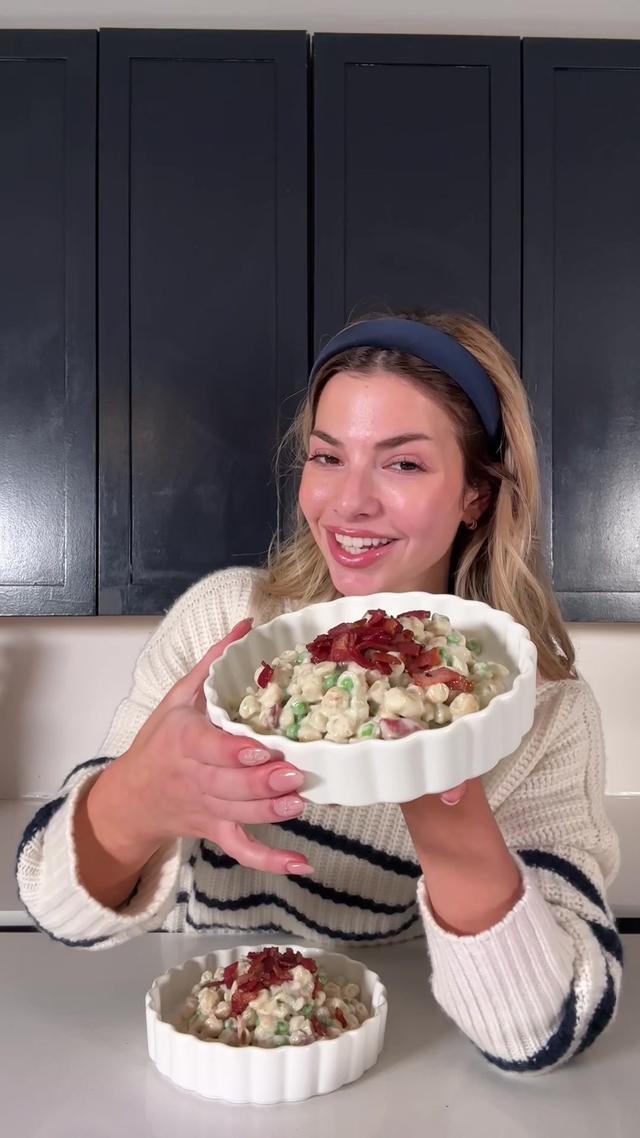 My elevated boxed Mac and cheese using all my favorite ingredients from @Getir US use code KIT for $30 free of groceries just for 2c #ad    Ingredients  -5 slices of thick cut bacon chopped -2 boxes Annie’s Mac and cheese  - 1 cup milk  -3 TBSP butter  -1/2 cup grated Parmesan  -1/4 cup grated white cheddar  -1/2 cup frozen peas - salt and pepper to taste  Directions -add bacon to a pan over medium heat until crisp then set aside  -bring 12 cups of salted water to a boil in a large pot  -boil Annie’s pasta shells for 8 minutes until cooked then strain and add back into your pot -to your pot over low heat add butter, one packet Annie’s cheese seasoning, Parmesan, milk, cheddar, and peas -mix until combined add more milk if need be -mix in half of your cooked bacon and reserve the rest for topping 