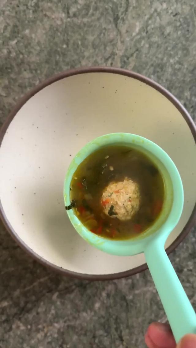 It's cold outside, so stay in and let @Getir US deliver everything you need (in literally 10 to 15 minutes) to make this cozy meatball soup! Use code SOHLA to get $20 of free groceries for just 2c #ad Sofrito Chicken Meatball Soup  1/2 cup torn bread 3 tablespoons milk or water 1/4 cup plus 2 tablespoons olive oil, divided 2 medium onions, chopped 2 medium red bell peppers, chopped 5 garlic cloves, chopped kosher salt 2 teaspoons smoked paprika, divided 1/2 cup parsley, chopped, plus more for garnish 1 lemon freshly ground black pepper 1 large egg 1 pound ground chicken 2 quarts chicken broth 1 can chickpeas, drained 1 bunch kale, stemmed and chopped 1. In a large bowl, mix bread and milk; set aside.  2. In a large pot, combine 1/4 cup oil, onions, pepper, garlic, and a big pinch of salt. Cook over medium heat, stirring frequently, until jammy and tender, 30 minutes. Add 1 teaspoon paprika. 3. Add half the pepper mixture to the bread mixture. Add the parsley, finely grated zest of the lemon, 1 teaspoon salt, pepper, and egg. Mix well. Add chicken and knead thoroughly until combined.  4. Add broth to remaining pepper mixture in pot. Add chickpeas and kale, season with salt and pepper, and bring to a bare simmer.  5. Form chicken mixture into ping pong sized balls and drop into soup. Cover and cook gently until cooked through, 20 minutes.  6. Meanwhile, in a small skillet combine remaining 2 tablespoons oil and 1 teaspoon paprika. Cook until fragrant, 1 minute. Garnish soup with paprika oil, parsley, and lemon juice. 